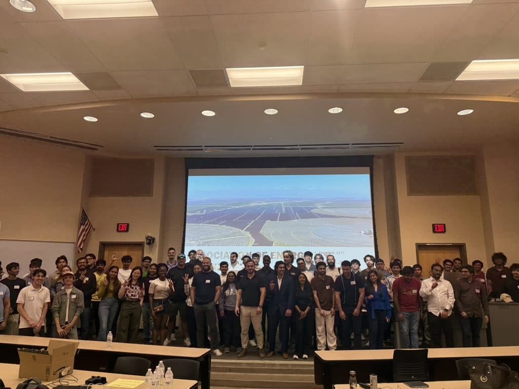 Participants, organizers and judges of the 2026 ASU Energy Hackathon standing together at the front of the lecture hall after the awards.